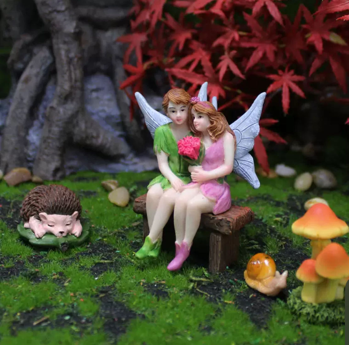 Fairy Garden Figurines Fairies sitting on the chair