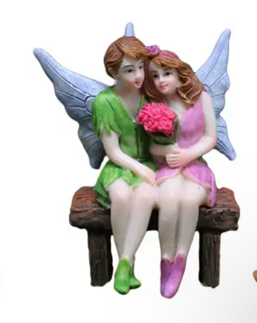 Fairy Garden Figurines Fairies sitting on the chair