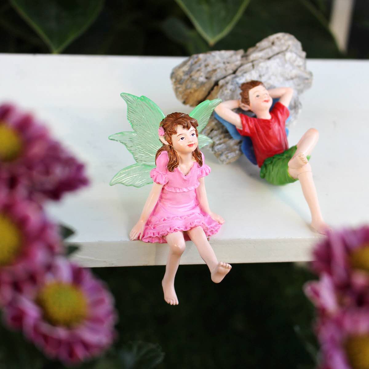 Fairy garden figurines sitting fairy girl and boy