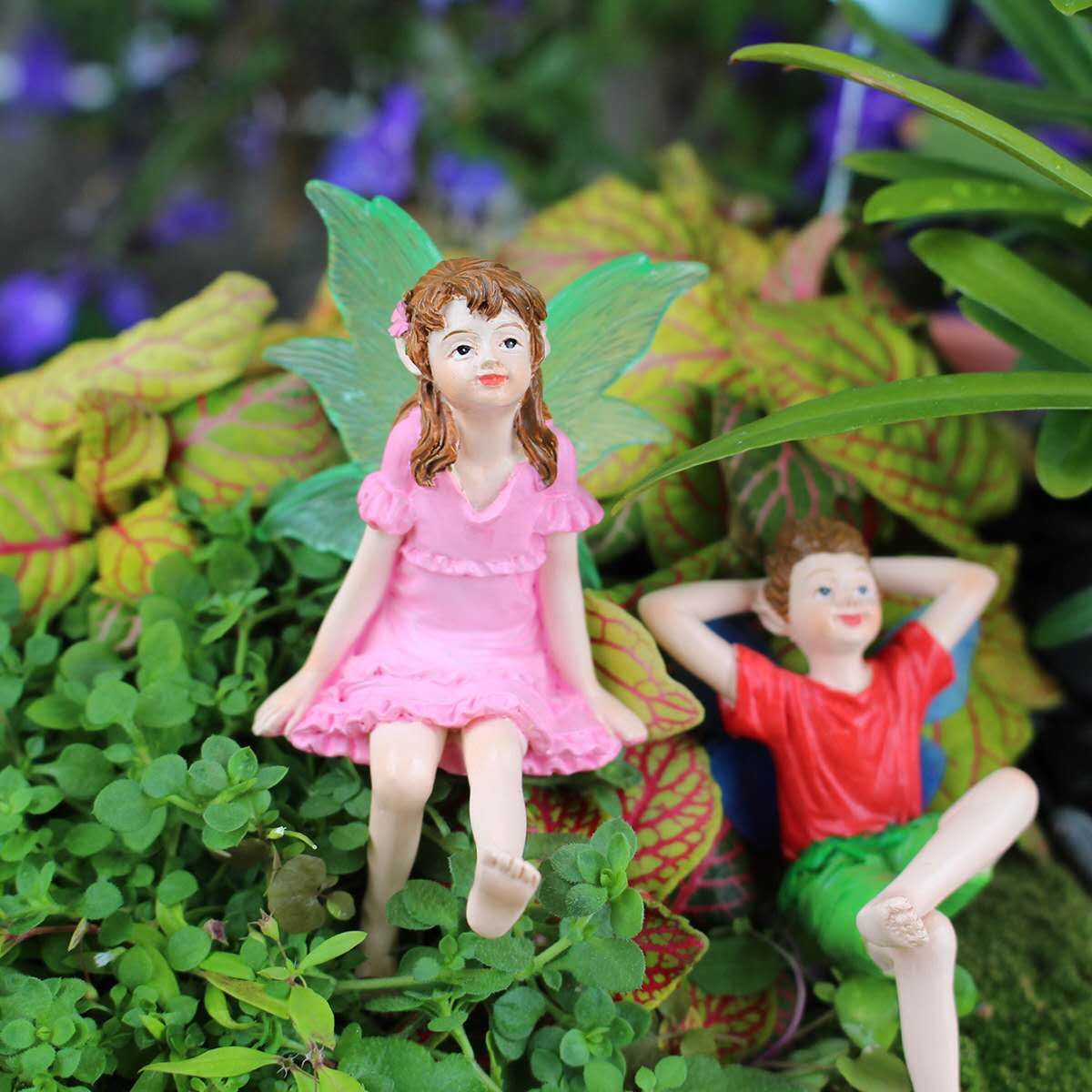 Fairy garden figurines sitting fairy girl and boy