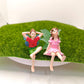 Fairy garden figurines sitting fairy girl and boy