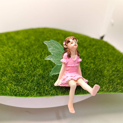 Fairy garden figurines sitting fairy girl and boy