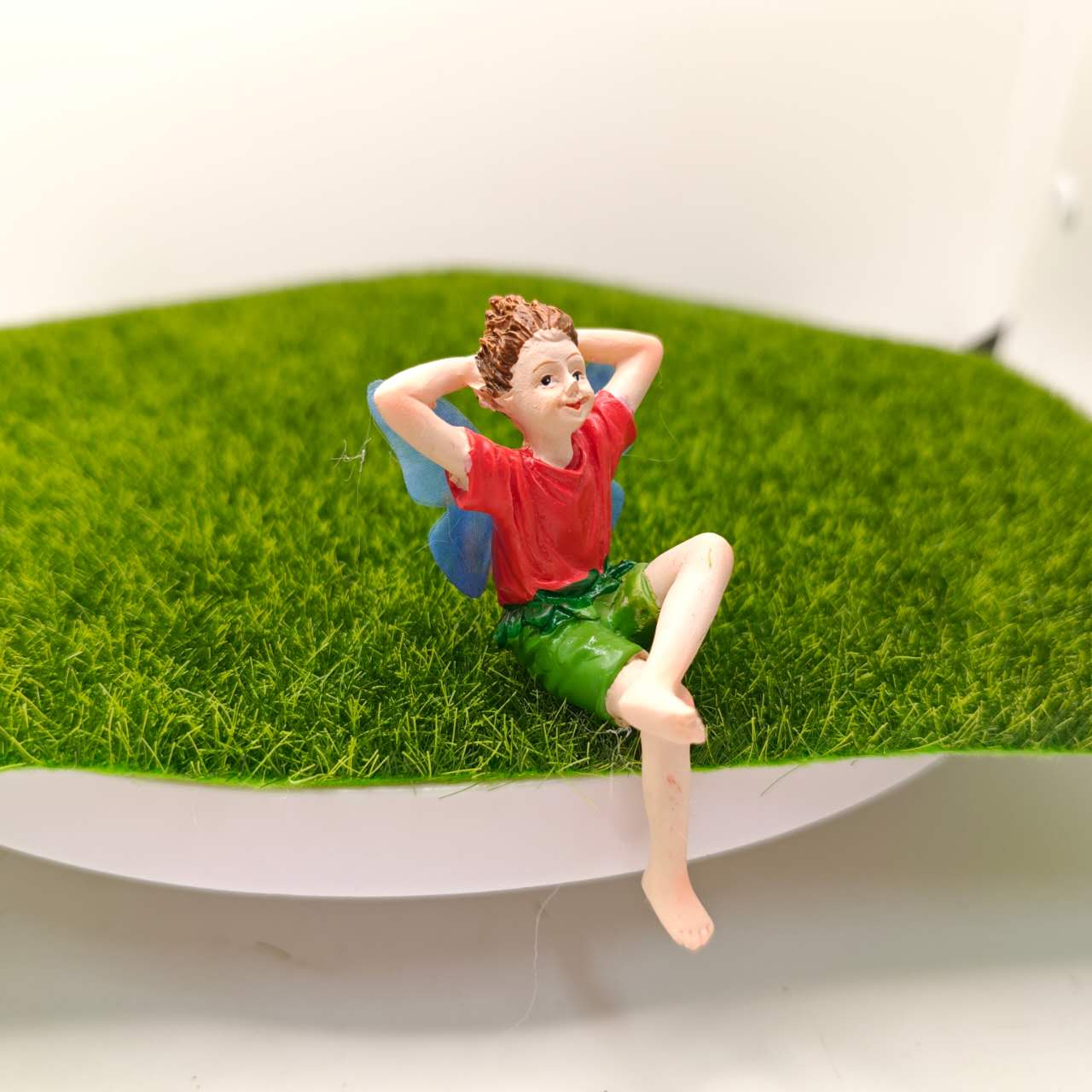 Fairy garden figurines sitting fairy girl and boy